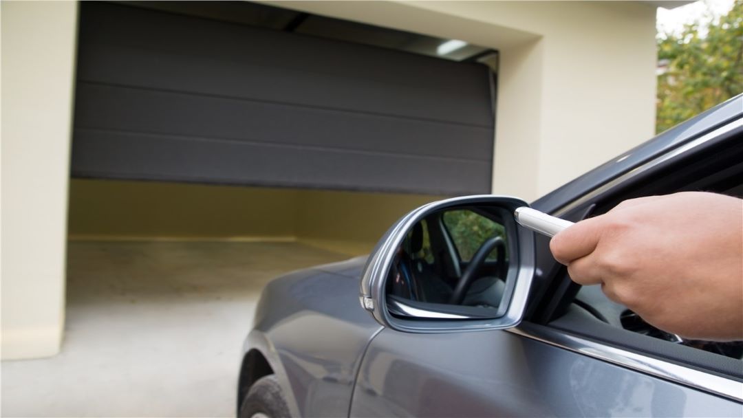 opening_garage_door_with_remote_overhead_door_&_operator_pensacola_9601_n._palafox_st_ste_6-a_pensacola_florida_32534.jpg